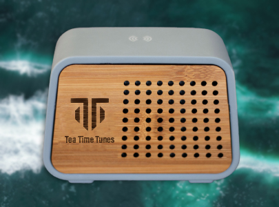 Custom decorated Temblor Speaker + Wireless Charger for Boston, MA Custom imprinted Temblor Speaker + Wireless Charger for Boston, MA with a local business logo